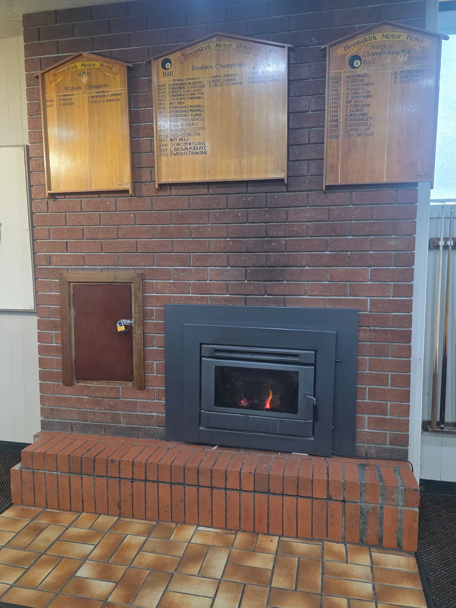 The log fire in the public bar, lit through the colder months